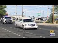 Casket of fallen Ofc Guerin Sandoval escorted from to Pueblo funeral home
