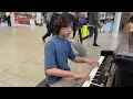 15 year old pianist plays RUSH E in public (the hardest piano song in the world)
