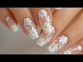 Elegant White Floral Nails Soft Nude Nail Art