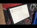 Removing a battery from a Nintendo switch lite