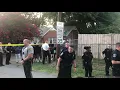Crowd confronts police following car chase