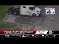 Police swarm FedeEx facility