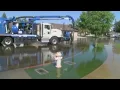 Overflowing ponding basin floods Kingsburg neighborhood