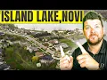 Island Lake of Novi MI Aerial Tour of a Luxury Waterfront Community