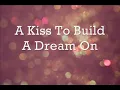 Louis Armstrong - A Kiss To Build A Dream On (lyrics)