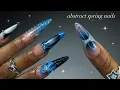 Blue Abstract Spring Nails almond nails intricate nail art