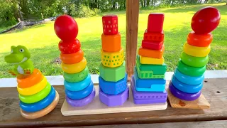 Stacking colorful wooden toy rings and shapes outdoors in peaceful nature scenery