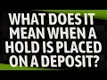 What does it mean when a hold is placed on a deposit