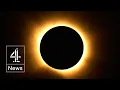 Eclipse plunges Europe into darkness - as it happened