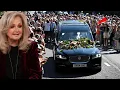 Thousands of Bonnie Tyler fans line the streets as coffin taken to Swansea home