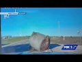 Dashcam shows Missouri trooper lifting hay bale