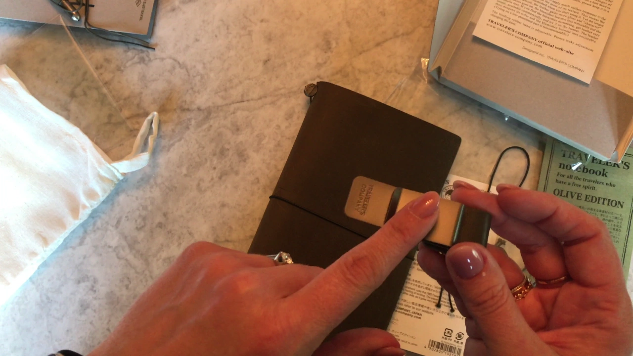 spiral paper notebook with pens. 