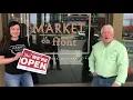Market on Front flips the sign to open
