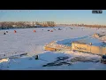 Time-lapse of ice fishing shelters via Saginaw River Cam Jan 31 2026 from 6 00 am 9 00 pm