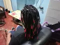 Semi-fullhead dreadlocks with Red Tip extensions The Dreadlocks Factory