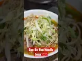 Lagu Garnishing A Bowl Of Bo Bun Hue Noodle Soup With Amazing Broth, Pig Feet, Blood Cake, And More!❤️🌶