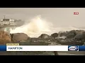 Splash-over seen at Hampton Beach as high tide approaches