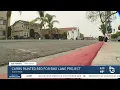 Curbs painted red in North Park for bike lane project