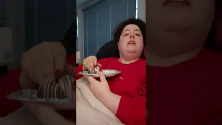 chubby girl eating chocolate covered strawberries