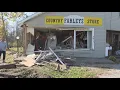 Geauga County Sheriff s deputy runs red light collides with truck causing crash into local business