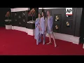 Miranda Lambert, HAIM, Ingrid Andress, Billie Eilish, and Jacob Collier pose on Grammys carpet