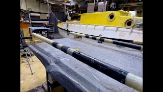 Reinforcing the yard for the halyard.