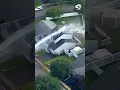 Water douses a house at a high rate of speed after a water main break in Edison New Jersey