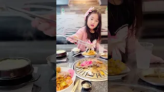 Suzy is cooking Korean BBQ