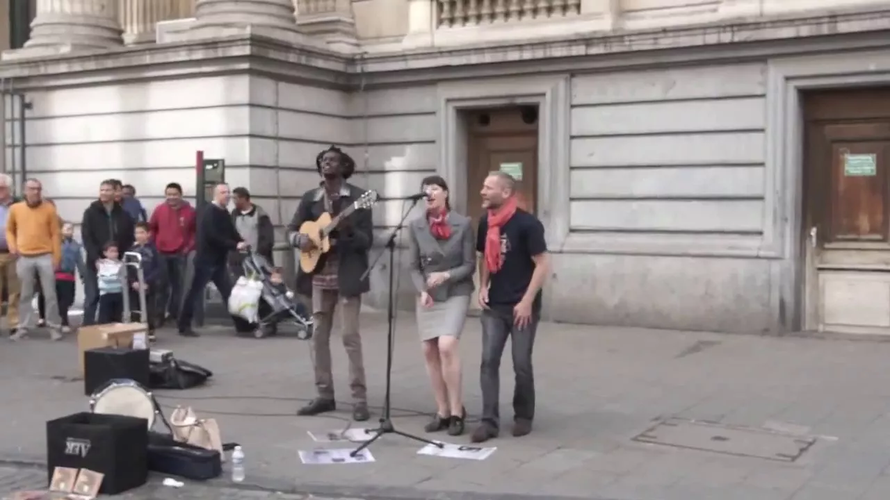 Reggae Busker singing three little birds (Street Performance)