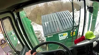 Waste Management front load Driver working at apartments