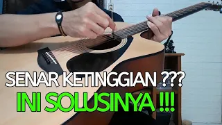 cara menurunkan action senar gitar akustik