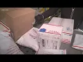 Hustle and bustle of the U S Postal Service in Akron during the holidays