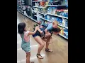 Toddler tickling his mom while strapped to her back