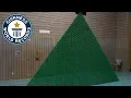 Download Lagu Most dominoes toppled in a 2D pyramid - Guinness World Records