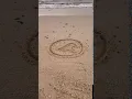 Scusset Beach 1620 Wave Logo in the sand at sunset!