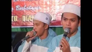 Download Al Munsyidin Al Madad MP3