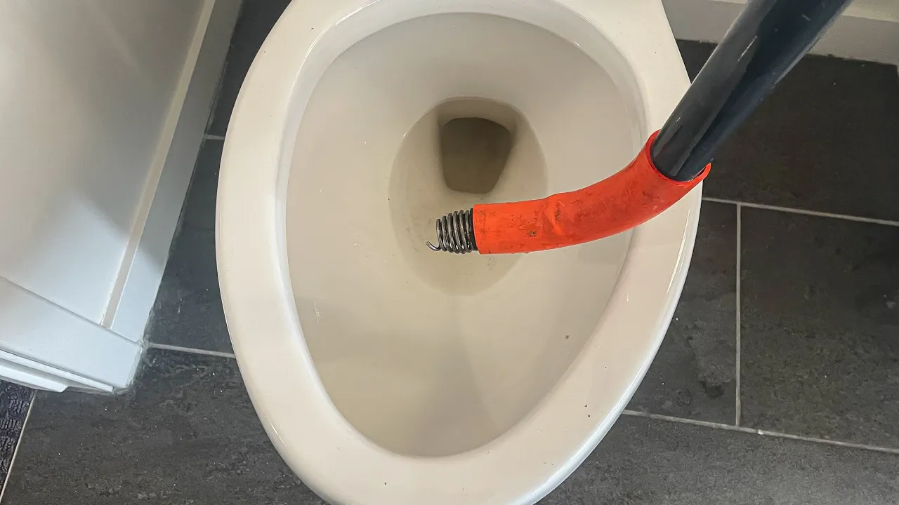 How to Use a Toilet Auger to Clear a Stubborn Clog