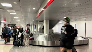 BOS Boston Logan International Airport in Massachusetts walking from gate to baggage and shuttle