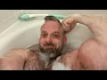 Hairy Muscle Daddy in The Bathtub Showing His Big Biceps