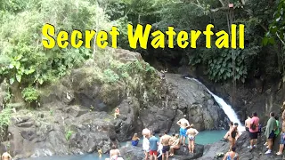 Jungle trek to secret waterfall high in the mountains
