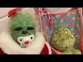 The Grinch Baby takes care of her baby grinch