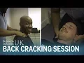 A chiropractor professionally cracked our backs