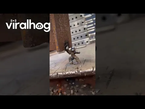 Tiny Welder Holds Up a Giant Steel Beam || ViralHog