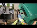 Switching Dumpsters at a Complex Roll Off Work Peterbilt Truck
