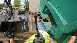 Switching Dumpsters at a Complex Roll Off Work Peterbilt Truck