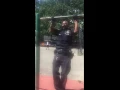 Police Officer Participates In Pull-up Park Jam In Uniform