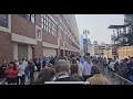 Very long line for Taylor Swift merchandise a day early at Ford Field