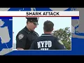 Officials survey Rockaway Beach after apparent shark attack