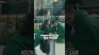 N3on arm wrestles Sam for a kiss