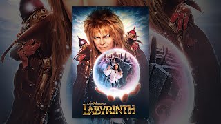 David Bowie as Jareth the Goblin King, holding a crystal ball with Sarah Williams (Jennifer Connelly), on the poster for Jim Henson's Labyrinth game.